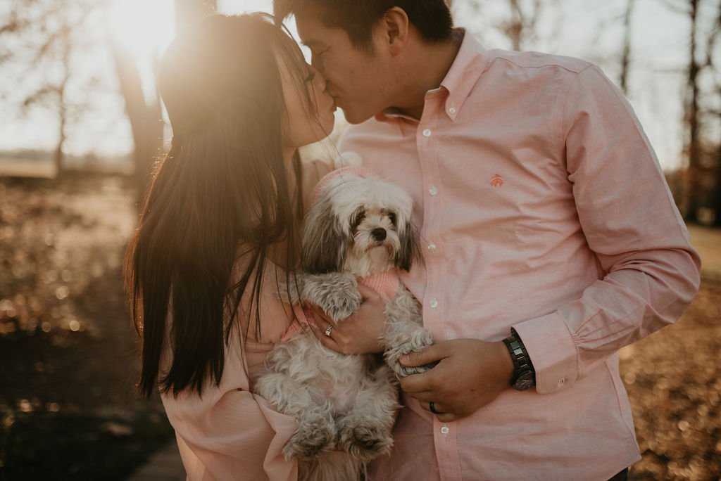 engagement photos of couple with dog